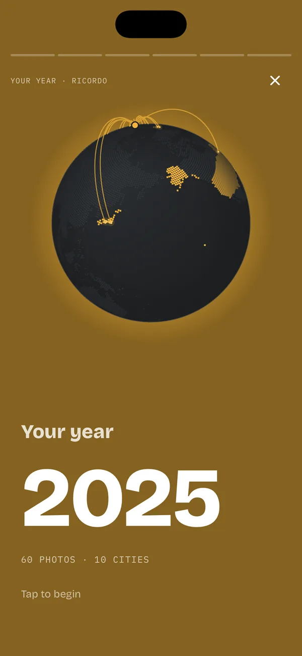 Your year 2025 on a globe lighting up: 60 photos, 10 cities.